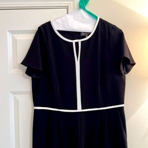 Black jumpsuit with white piping